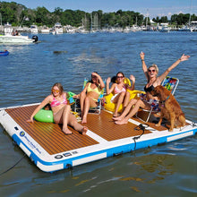 People and a dog on Island Hopper Mega Yacht Dock 10 x 10 ft Inflatable Water Island Platform  in the background