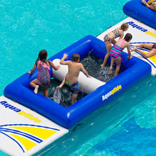 Children playing on an Aquaglide inflatable pool toy in a pool.