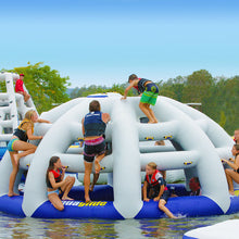 Inflatable water park with people on a sunny day