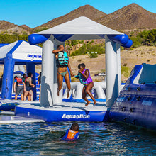 People on Aquaglide Universal Pavillion  with mountains in the background