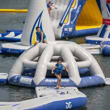 Inflatable water park with people on a sunny day