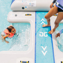 Children playing on a pool toy with a visible brand logo in a pool setting.