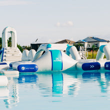 Inflatable water toys on a pool with visible branding