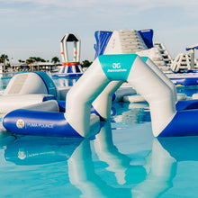 Inflatable water toys in a pool with visible branding