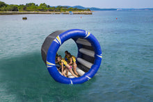 Aquaglide Cyclone Wheel with people in the water on a sunny day
