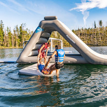 Three people on Aquaglide Half Deck 7.5 