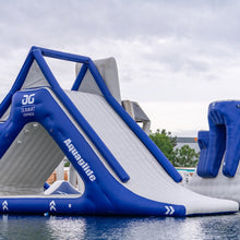 Inflatable water slide with blue and white design, featuring Summit Express, on a cloudy day.