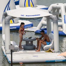 Two people on Aquaglide Ohana Lounge 