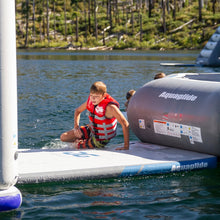 Child in a life jacket on an Aquaglide Half Deck 7.5