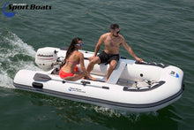Two people on Island Hopper Killer Whale 10.8′ Inflatable Fishing Boat with a Johnson outboard motor, on a body of water.
