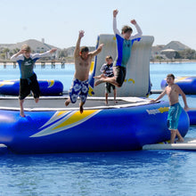Children jumping off Aquaglide Water Trampoline Supertramp 17 into a body of water.