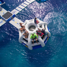 Inflatable water toy with people on a sunny day in the ocean