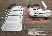 An inflatable boat paddle set laid out on a paved surface, including a white inflatable paddle with numbered slots, aluminum shafts, a gray storage bag, a white Sport Boats carrying bag, tools, and an instruction text overlay detailing what is included.