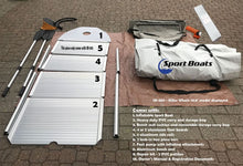 An inflatable boat paddle set laid out on a paved surface, including a white inflatable paddle with numbered slots, aluminum shafts, a gray storage bag, a white Sport Boats carrying bag, tools, and an instruction text overlay detailing what is included.