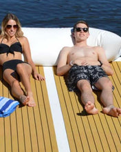 A man and a woman is using Island Hopper Inflatable Pillow