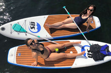 Two women relax on Island Hopper Inflatable Sport Board 