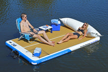 Two people relaxing on Island Hopper Yacht Dock 10 x 6 ft Inflatable Boat Dock Swim Platform